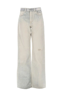 Our Legacy women’s light-wash denim jeans with wide-leg cut and subtle distressing at the knees in Wata Blue
