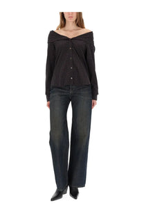 Our legacy women’s kaonashi shirt black is a black and brown plaid off-the-shoulder button-up blouse
