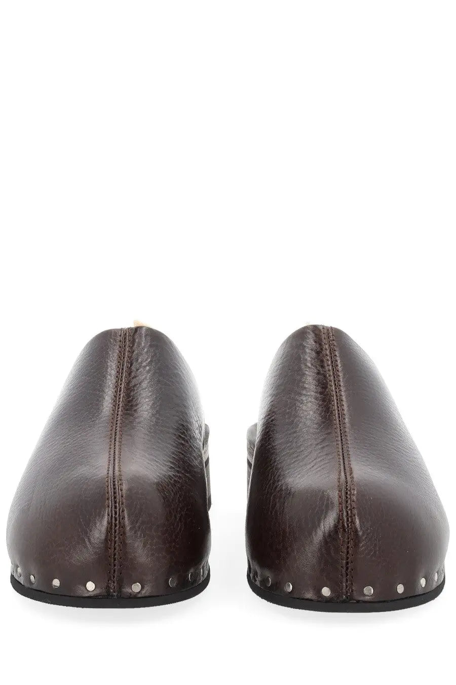 Brown leather mules with silver studs along the sole from Our Legacy women’s sandal naoto black collection