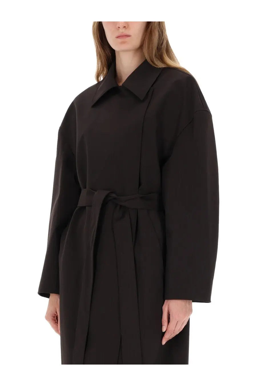 Our legacy women’s trench coat churchill black featuring a black belted relaxed fit with a structured collar