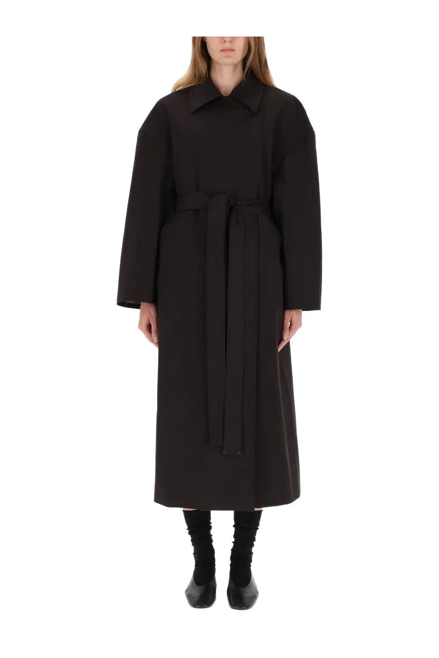 Our Legacy women’s black trench coat Churchill features a black belt and structured collar with long sleeves
