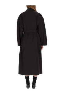 Our Legacy women’s trench coat Churchill black with belted waist and structured shoulders in classic black wool blend