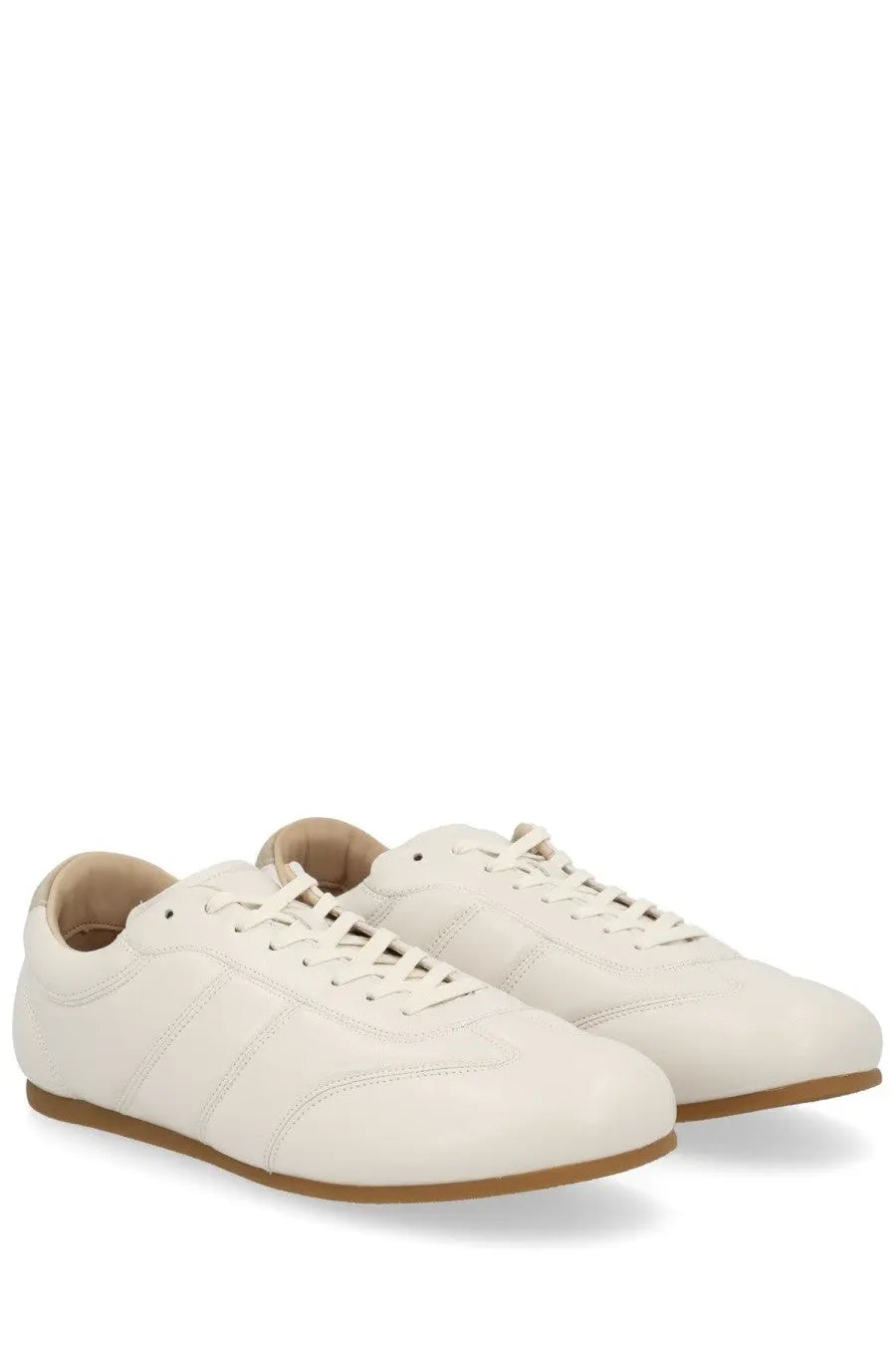 Lemaire men’s soft runner sneaker beige cream-colored leather with minimalist design and tan rubber soles