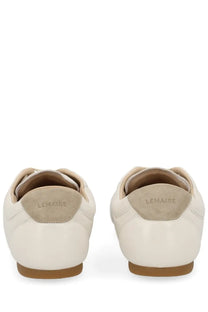 Cream-colored leather Lemaire men’s soft runner sneaker with suede heel tab and branded detailing