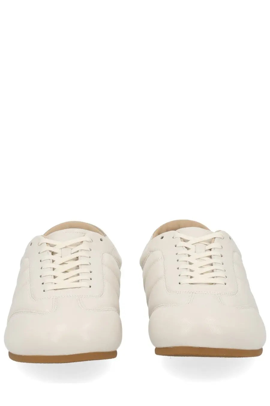 Lemaire men’s soft runner sneaker in white leather with beige laces and tan rubber sole for casual wear