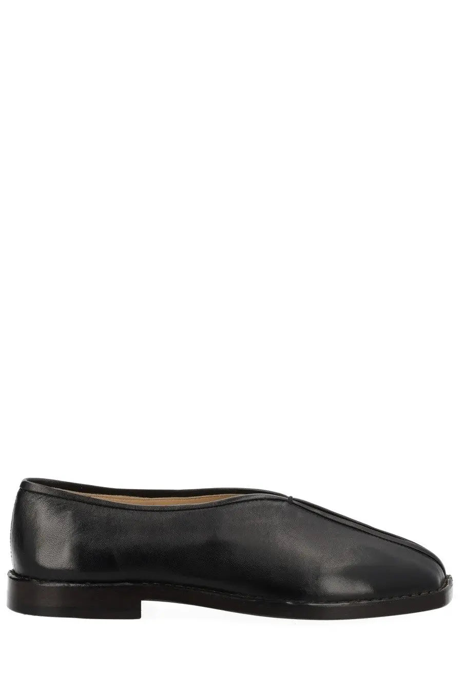 Lemaire women’s black leather moccasin flat piped slipper with minimalist design and low block heel