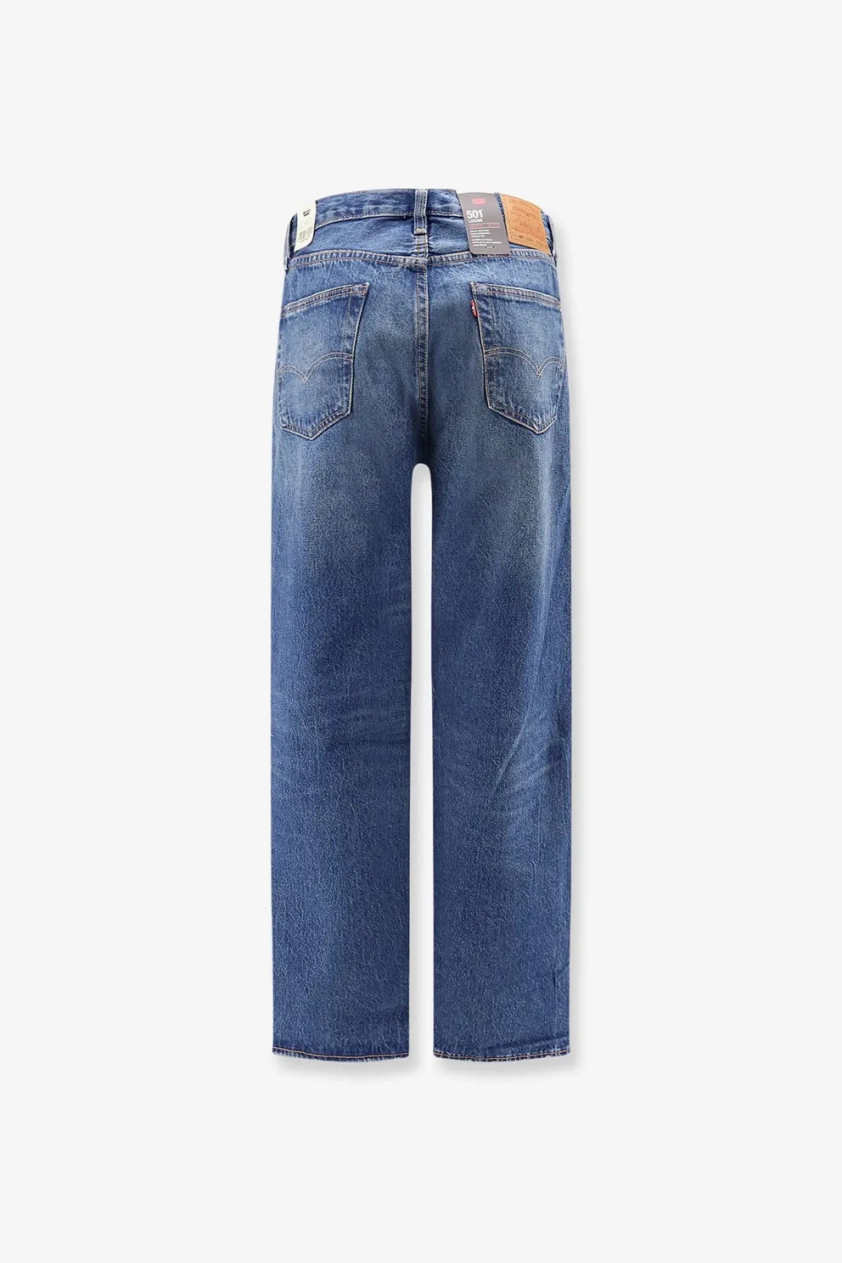 Levis men’s blue denim jeans with classic five-pocket design and brown leather brand tag at waistband