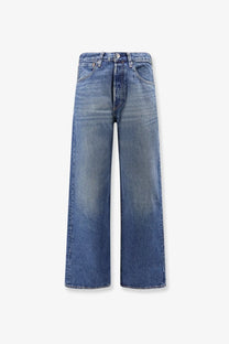Levis men’s blue denim jeans gold high-waisted wide-leg medium blue wash with classic stitching and button closure