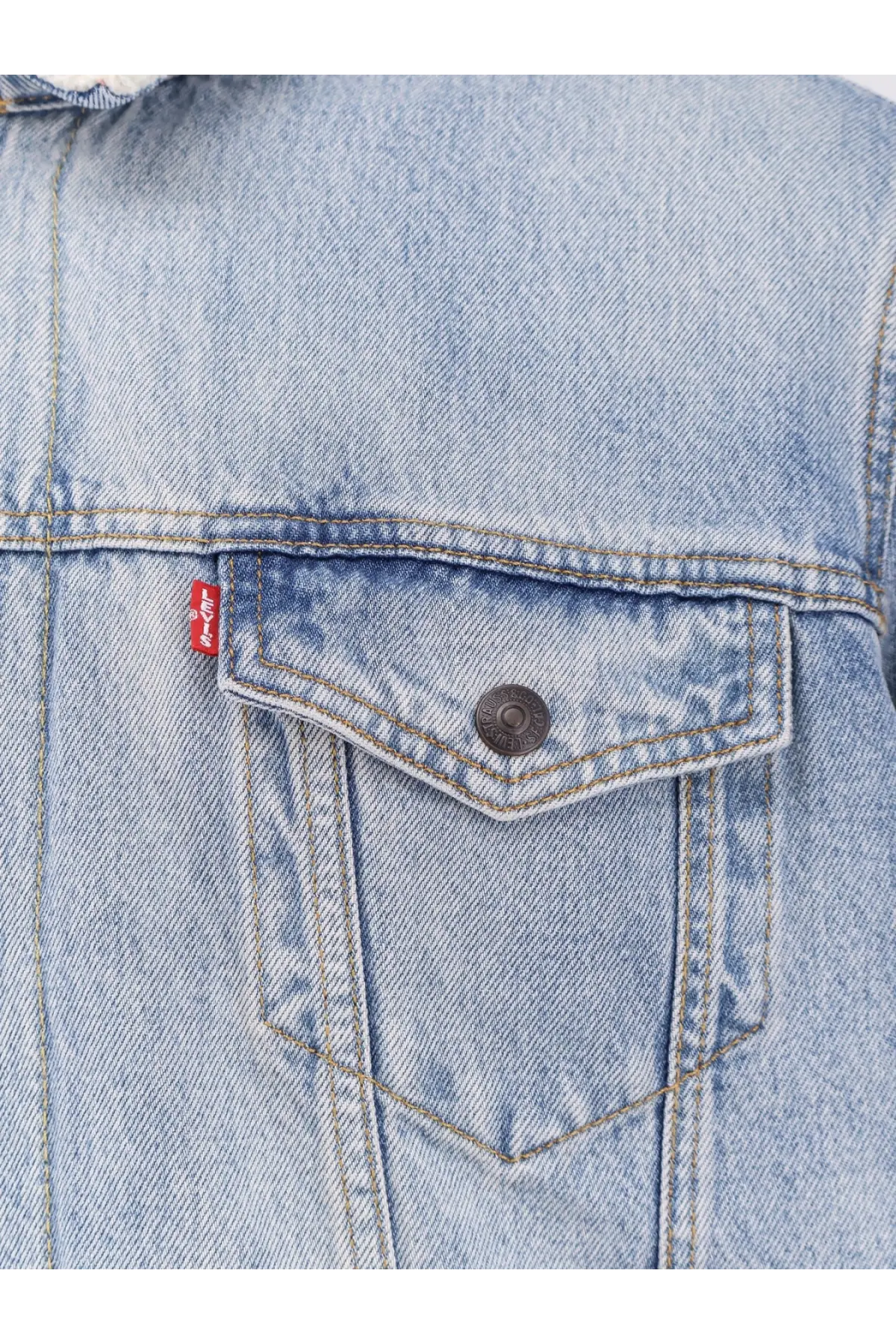 Levi’s men’s denim jacket in light-wash blue with a red Levi’s tab on the chest pocket made of denim material