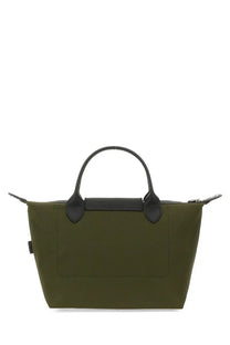 Olive green longchamp le pliage tote bag with black leather handles and trim in borsa con manico le pliage xtra brown