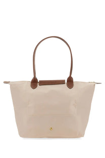 Longchamp women’s borsa le pliage large tote bag beige with brown leather handles and trim in white design
