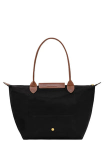 Longchamp women’s le pliage medium black tote bag with brown leather handles and gold-tone metal clasp