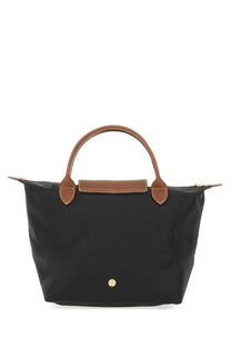 Longchamp women’s borsa le pliage small black tote bag with brown leather handles and trim made of nylon