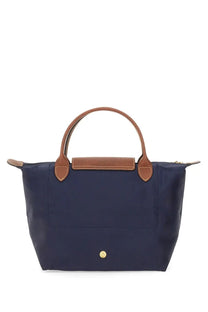 Navy blue Longchamp Le Pliage small tote bag with tan leather handles and gold-tone logo button for women