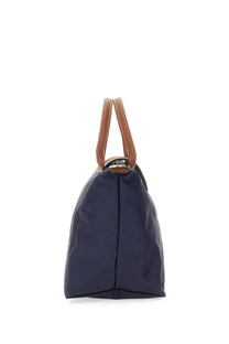 Longchamp women’s borsa le pliage small navy blue nylon tote bag with tan leather handles and gold-tone clasp