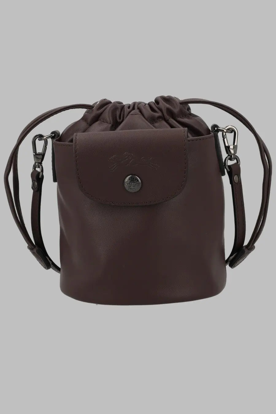 Longchamp womens brown leather bucket bag with drawstring top and adjustable shoulder strap in extra small size