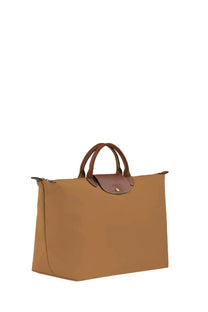 Longchamp women’s borsone da viaggio beige tan canvas tote bag with brown leather handles and matching flap