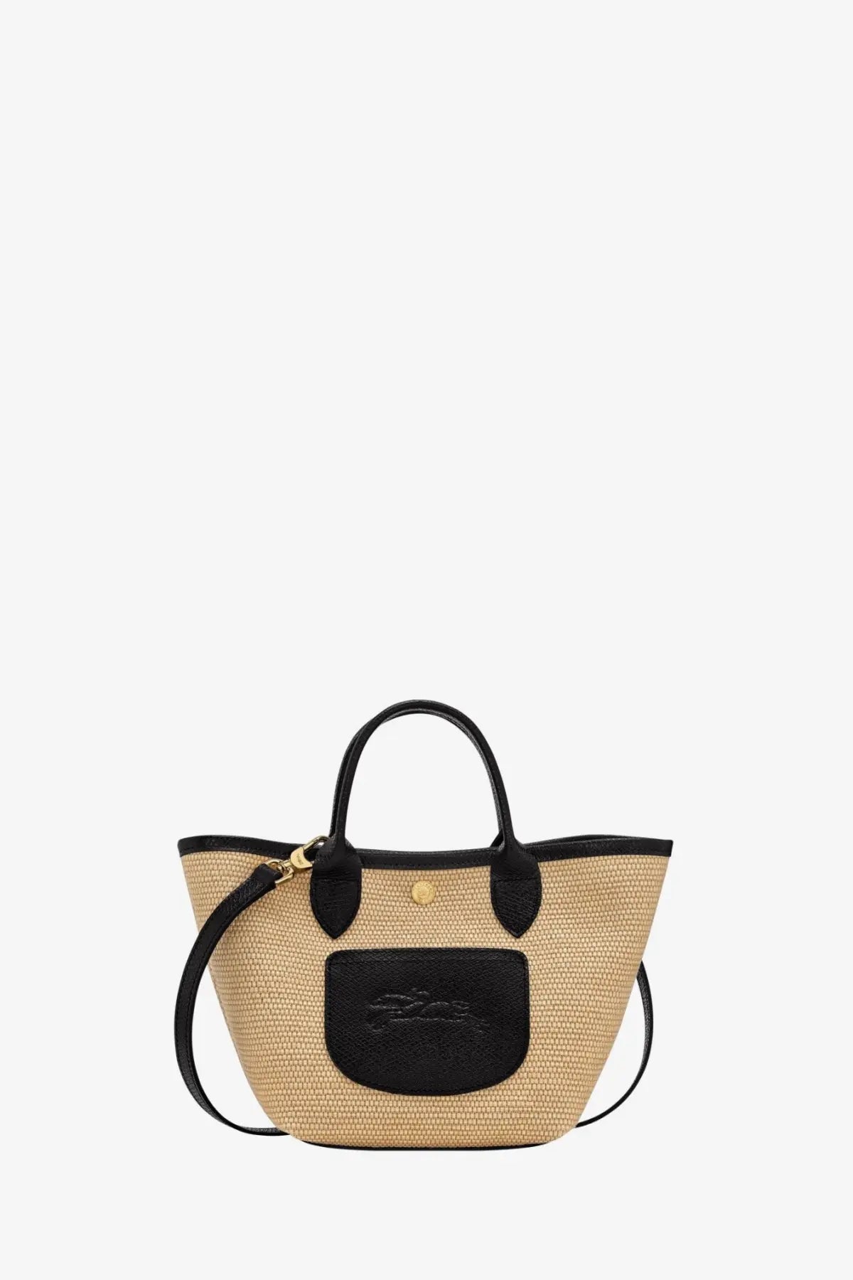 Beige woven straw tote with black leather handles trim and front patch in longchamp women’s le panet pliage xs style