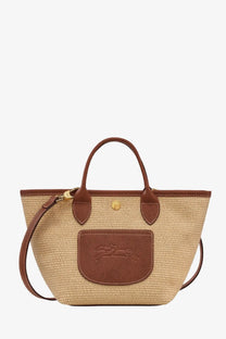 Longchamp women’s le panier pliage xs raffia and leather crossbody bag in beige woven straw with brown leather handles and gold hardware