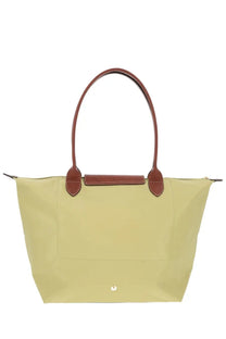 Longchamp women’s LE Pliage large tote bag in pale green with brown leather handles and trim