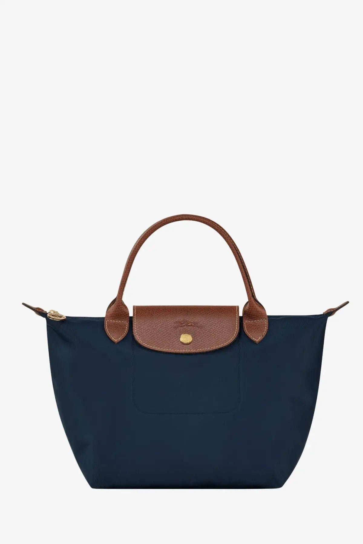 Navy blue Longchamp women’s le pliage nylon handbag with brown leather handles and matching flap in front view
