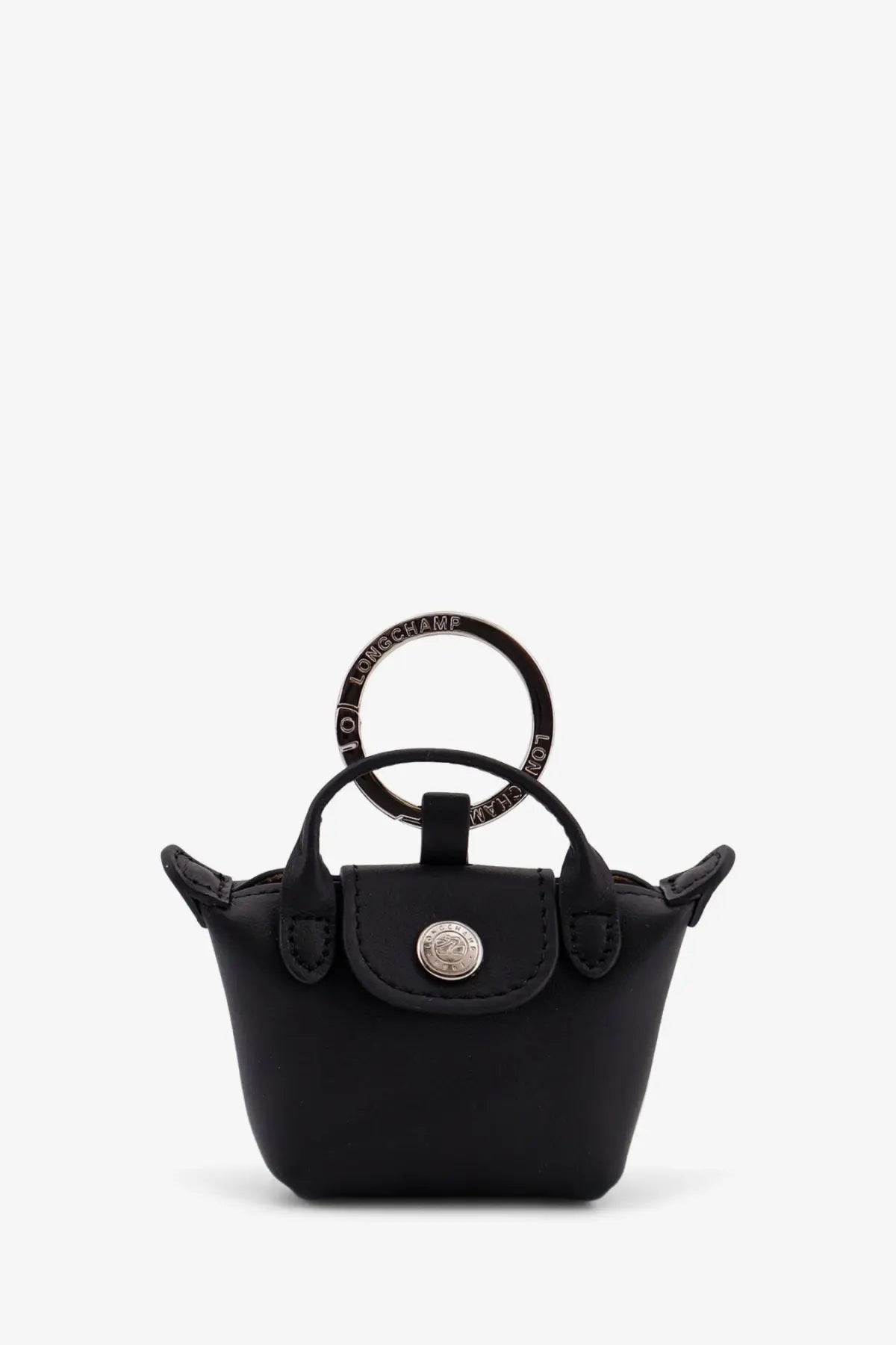 Longchamp women’s le pliage xtra leather keychain black featuring a black mini handbag with circular handle and silver logo clasp
