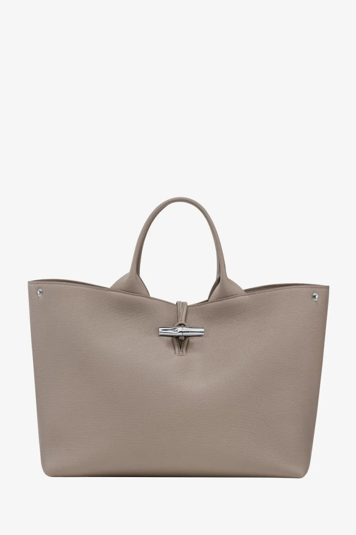 Beige longchamp women’s le roseau leather tote bag with textured finish and silver-tone metal clasp and handles