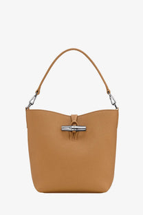 Longchamp women’s le roseau xs tan leather bucket bag with silver-tone metal clasp and matching handle