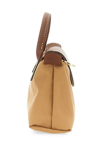 Tan leather longchamp women’s pochette le pliage original beige handbag with brown accents and gold-tone hardware