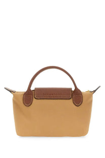 Longchamp women’s pochette le pliage beige handbag with tan leather handles and matching flap in mini size