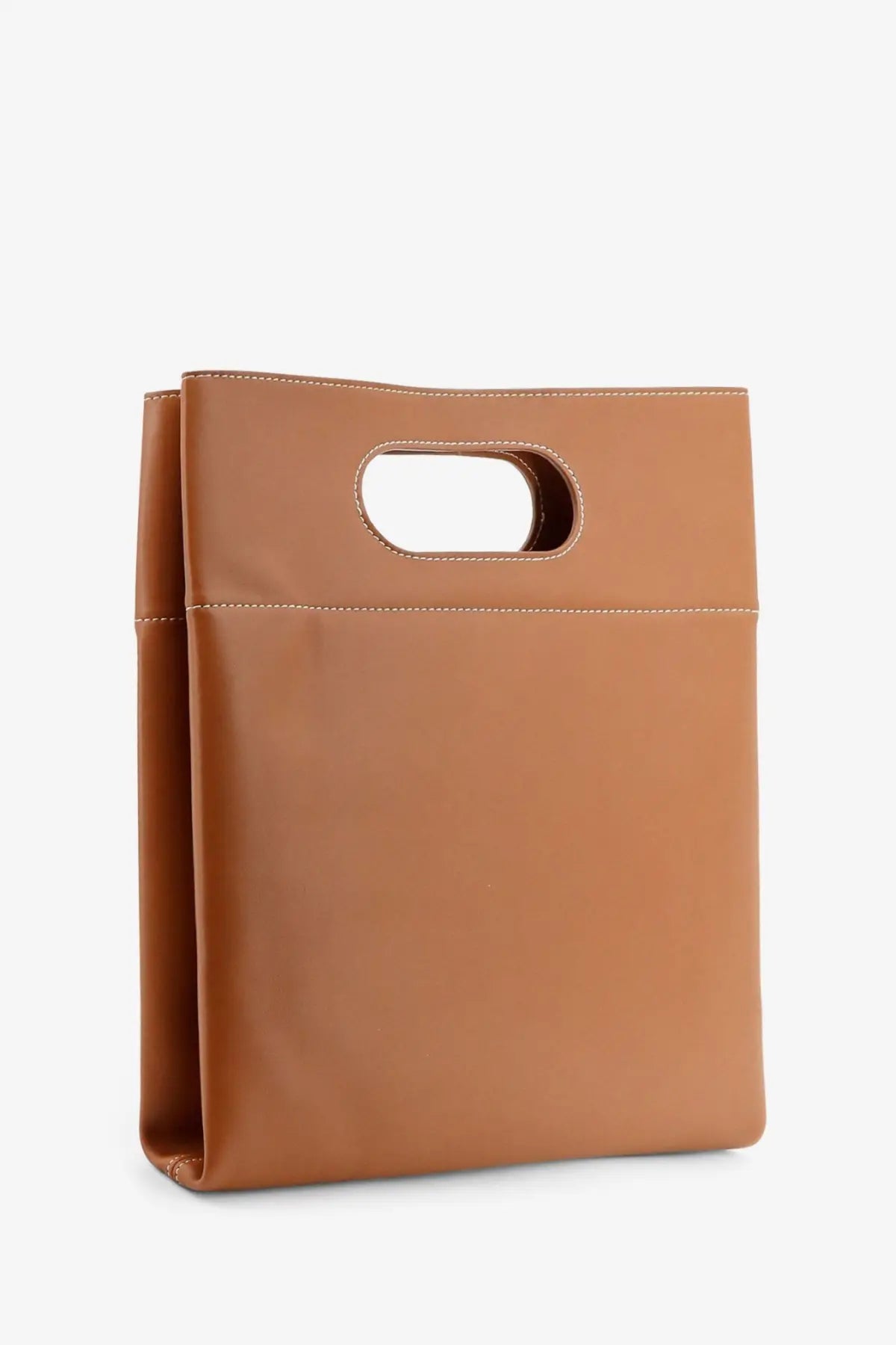 Tan leather tote bag with minimalist oval handle cutout and white stitching by loro piana tart collection