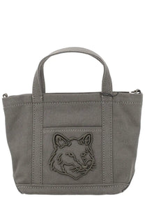 Maison Kitsuné women’s gray canvas tote bag with stitched fox face emblem on the front for casual use