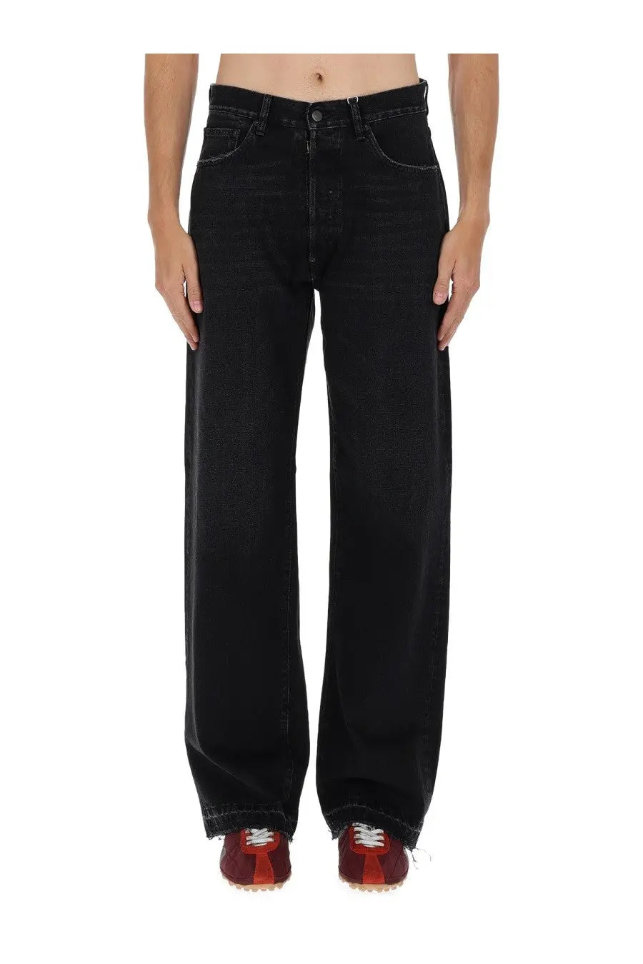Maison Margiela men’s black high-waisted wide-leg denim jeans with straight-cut silhouette and frayed hems
