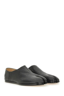 Maison Margiela men’s black leather tabi mules with minimalist design and stitched toe separation visible from front