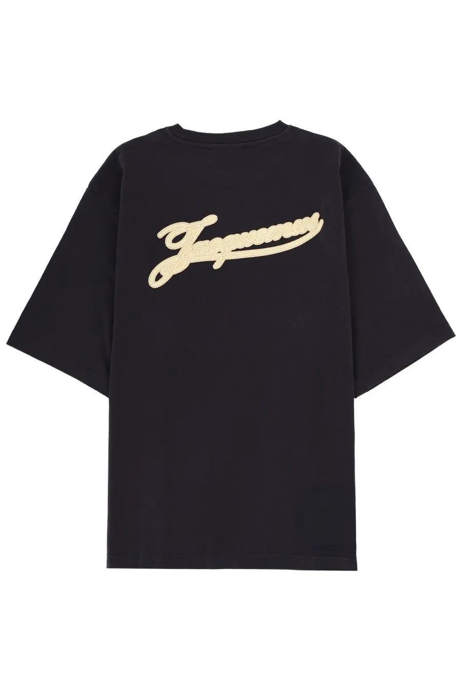 Back view of black oversized t shirt with cream embroidered jaguar logo paired with maison margiela men’s silver necklace