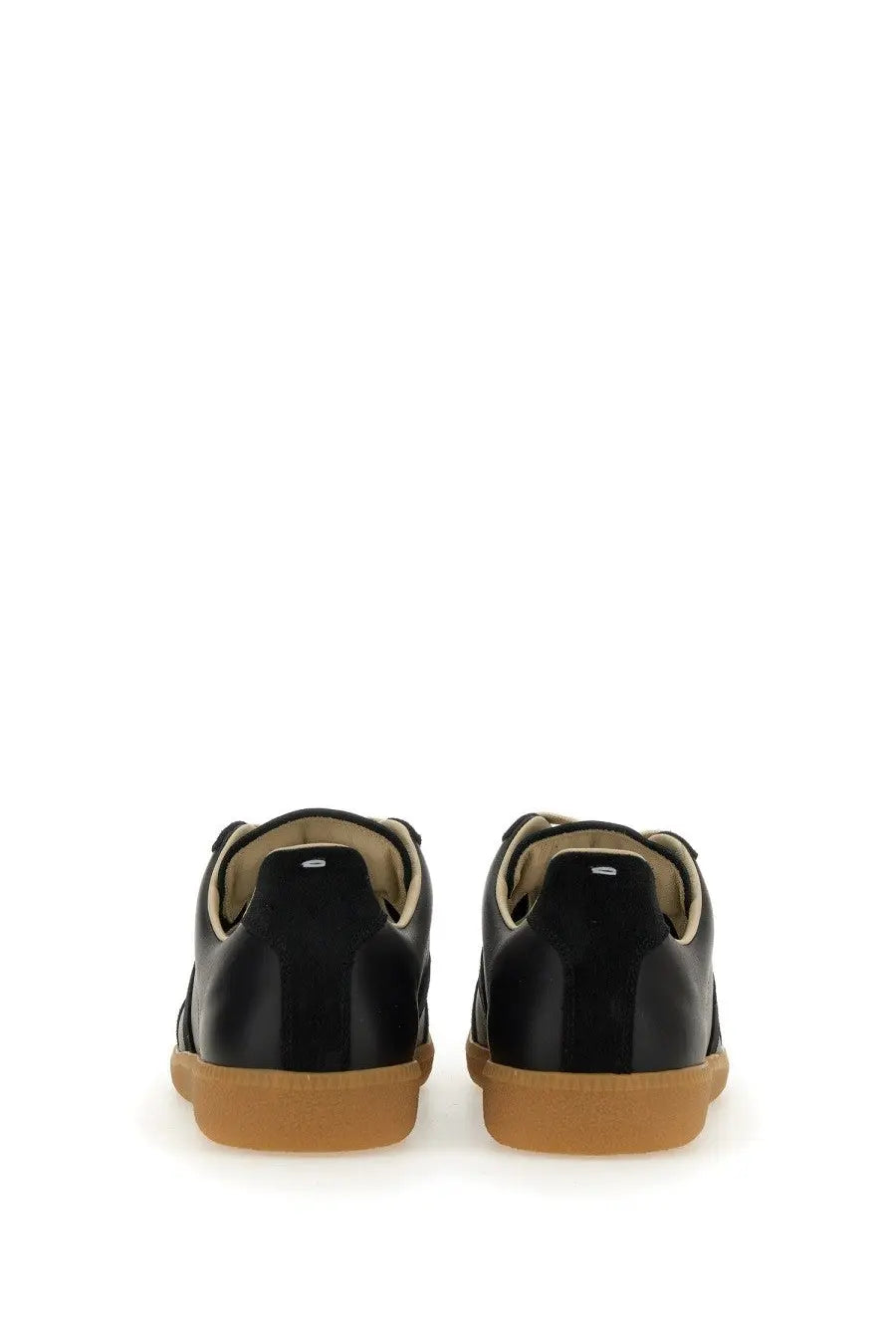 Maison Margiela men’s replica sneaker black patent leather with tan rubber soles and beige lining front view