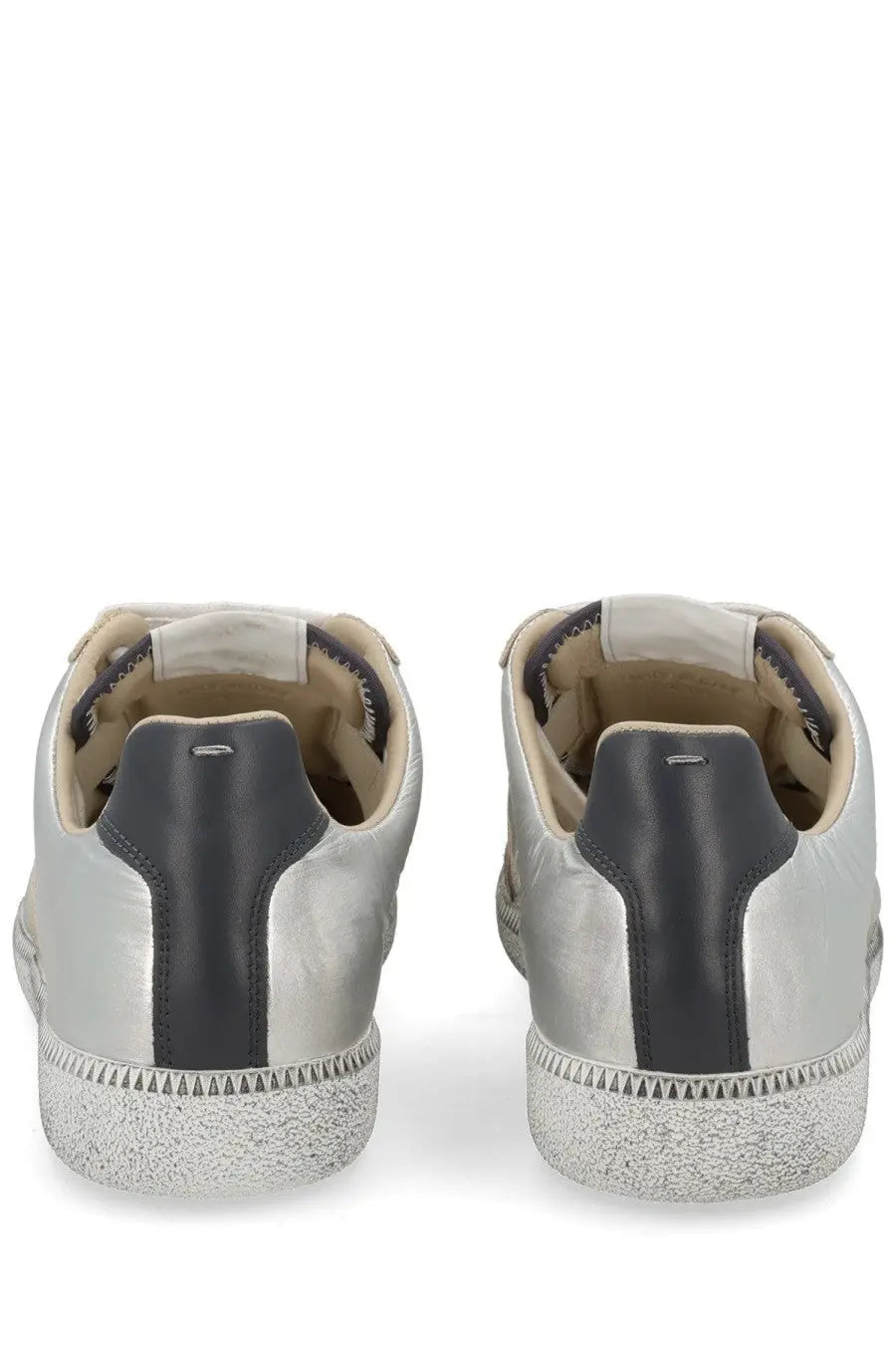 Maison Margiela men’s replica sneakers in silver and black leather with a textured rubber sole