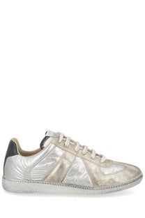 Maison Margiela men’s replica sneaker in silver metallic leather with textured reflective finish and black heel tab
