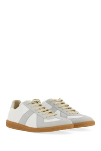 Maison Margiela men’s replica sneaker low-top in light gray and white suede with beige laces and tan rubber sole