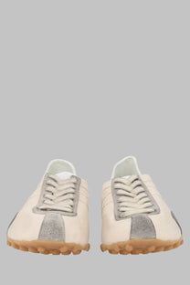 Maison Margiela men’s sneaker sprinters cream suede with silver metallic stripes and tan rubber sole front view
