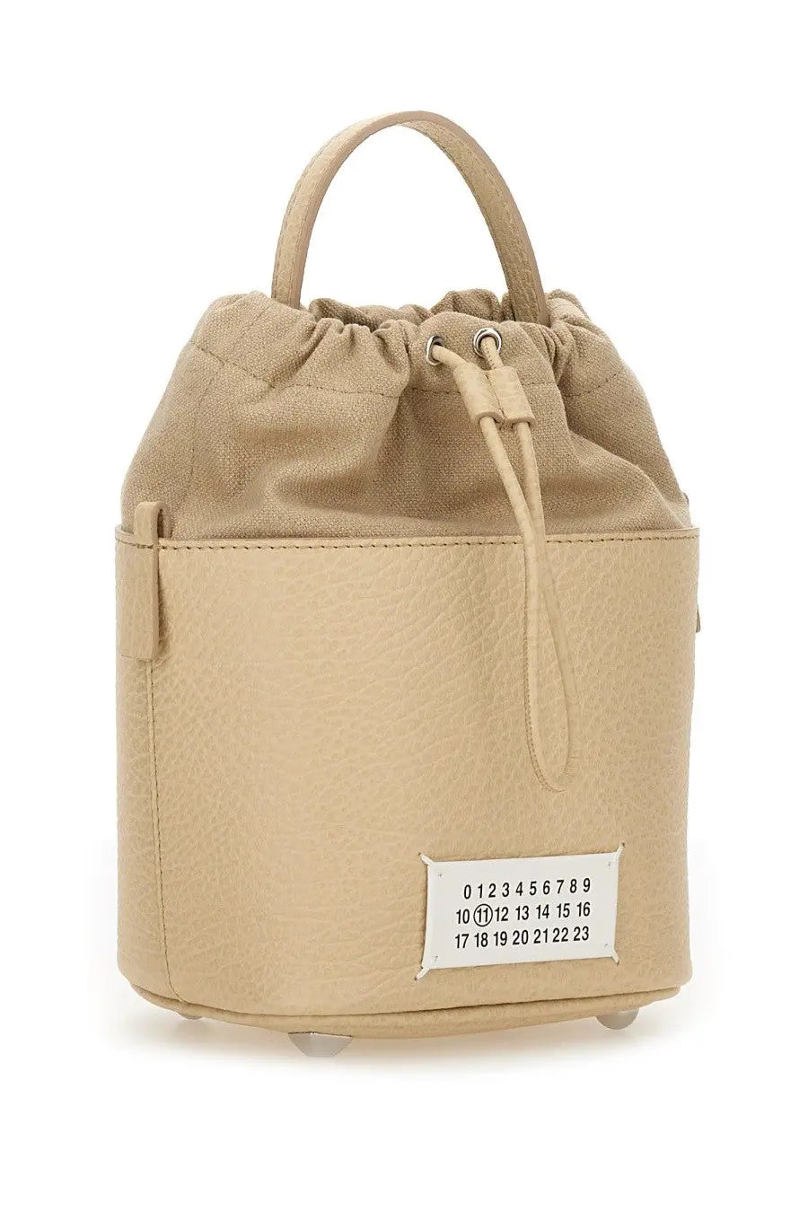 Beige canvas and leather Maison Margiela unisex bucket bag with drawstring top and white label patch 01-23 sequence
