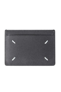Maison Margiela unisex black leather card holder with white stitching forming a minimalist cross pattern