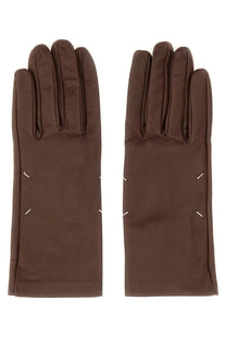 Maison Margiela women’s brown leather gloves with distinctive white stitching along the seams back side view