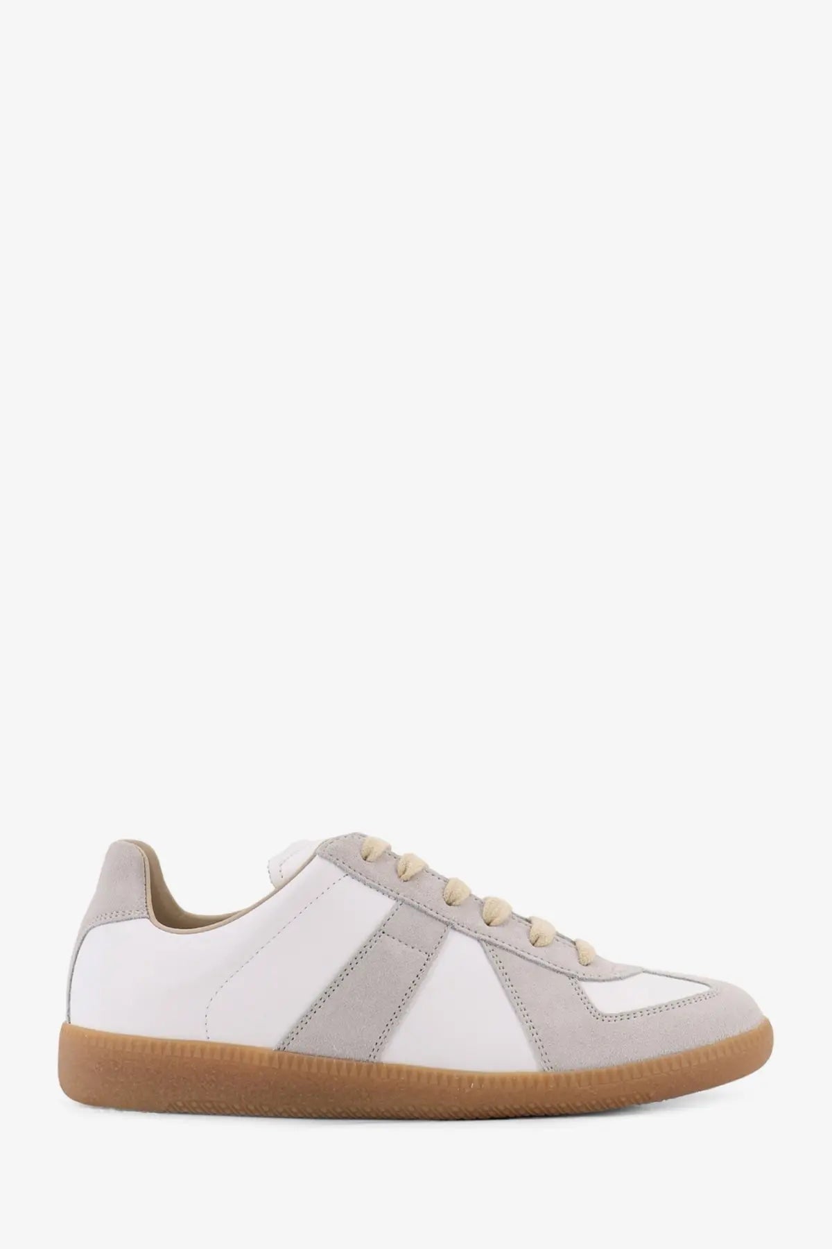 Maison Margiela women’s leather sneakers in white suede with light gray accents and tan rubber sole for casual wear