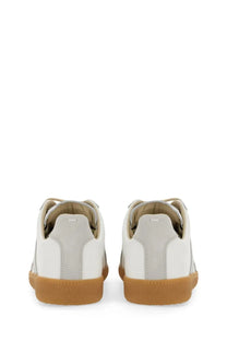 Maison Margiela women’s replica sneaker white leather with tan rubber soles and subtle gray stitching details