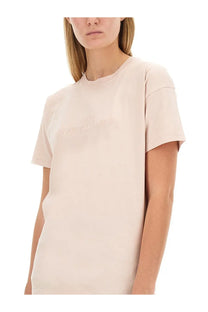 Maison margiela women’s beige oversized cotton t shirt with soft blush color and subtle embroidered logo on chest
