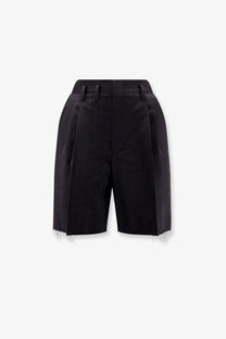 Maison Margiela women’s black striped virgin wool shorts with tailored waistband and frayed hem front view