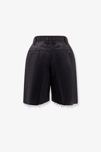 Maison Margiela women’s black virgin wool shorts with tailored waistband subtle vertical stripes and frayed hem detailing