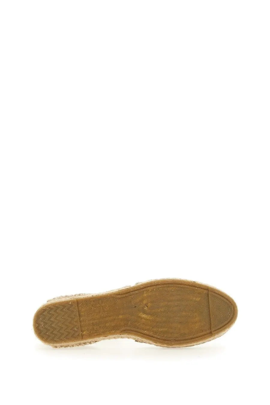 Tan woven sole of manebi women’s beige wedge espadrille shoe with rubberized tread pattern shown from back side
