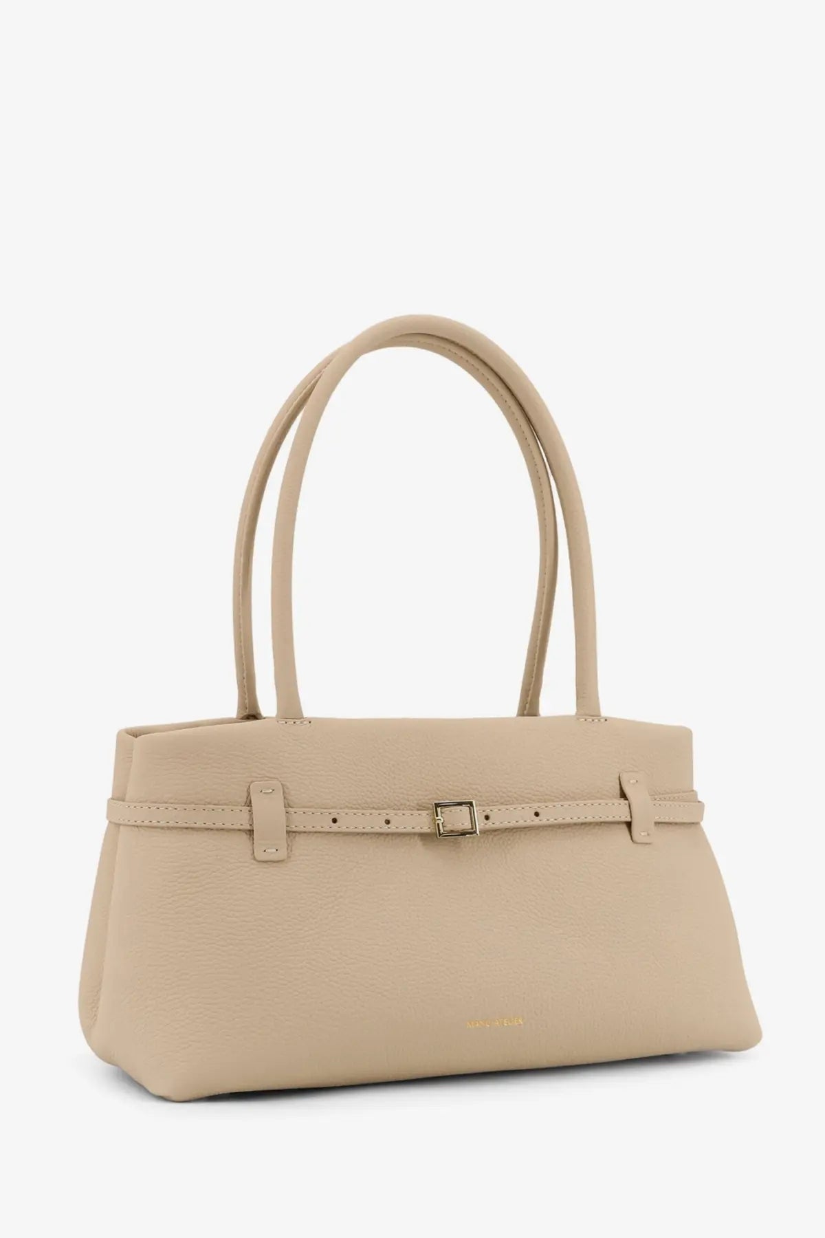 Beige leather handbag with curved top handles and central buckle strap from manu atelier womens shoulder bag line
